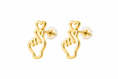 A pair of gold-toned stud earrings shaped like a hand forming a heart with the fingers, shown on a plain white background.