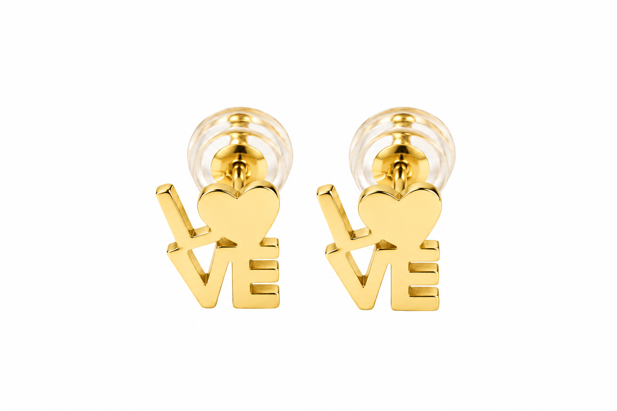 A pair of gold-tone stud earrings shaped like the word LOVE, with a heart symbol replacing the O, shown on a plain white background.